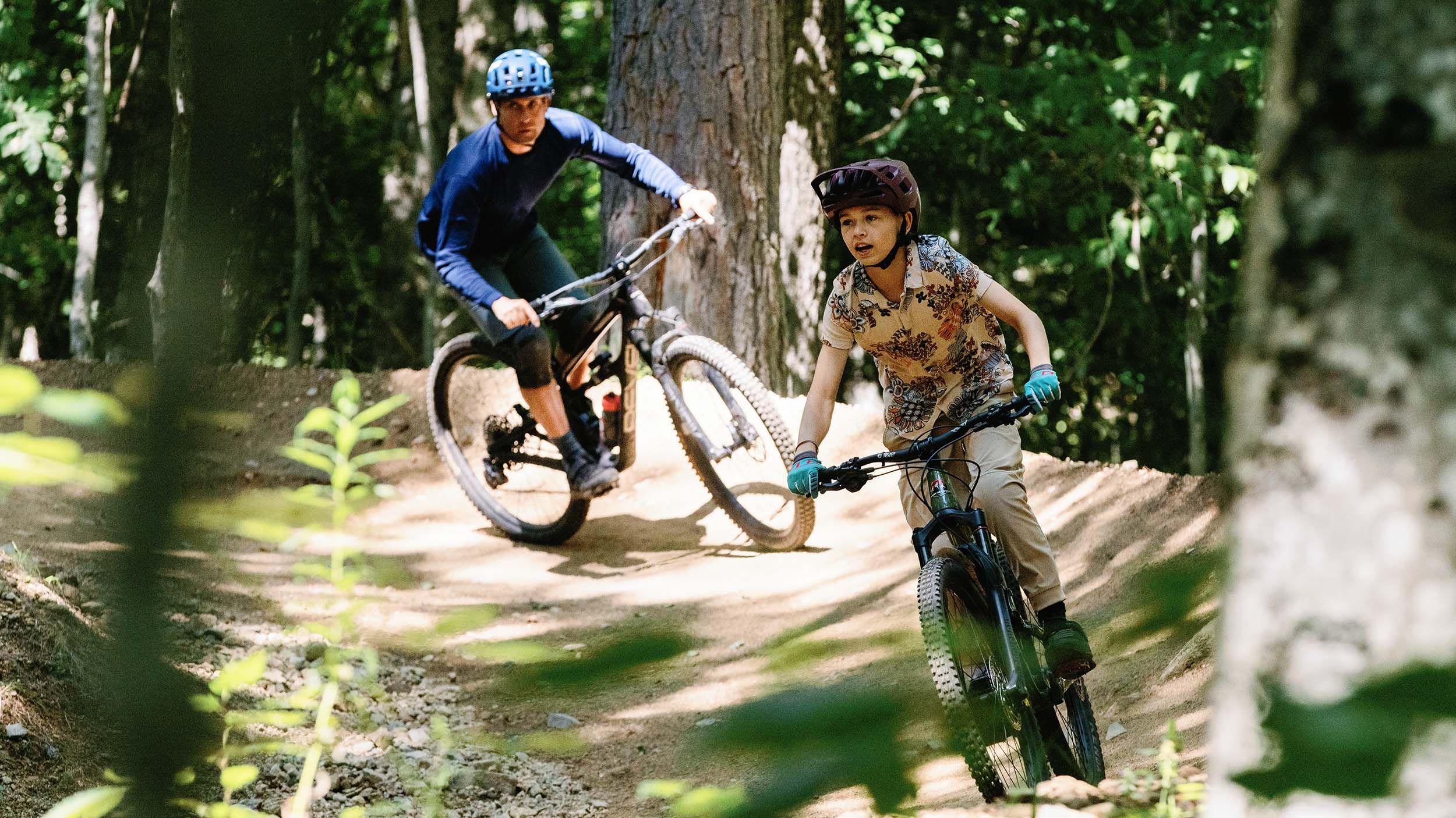 group of mountain bikers underneath the Gondola
