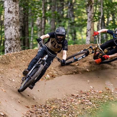 Two Bikers on Downhill Trails