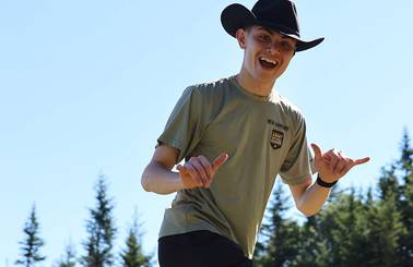 male racer wearing cowboy hat
