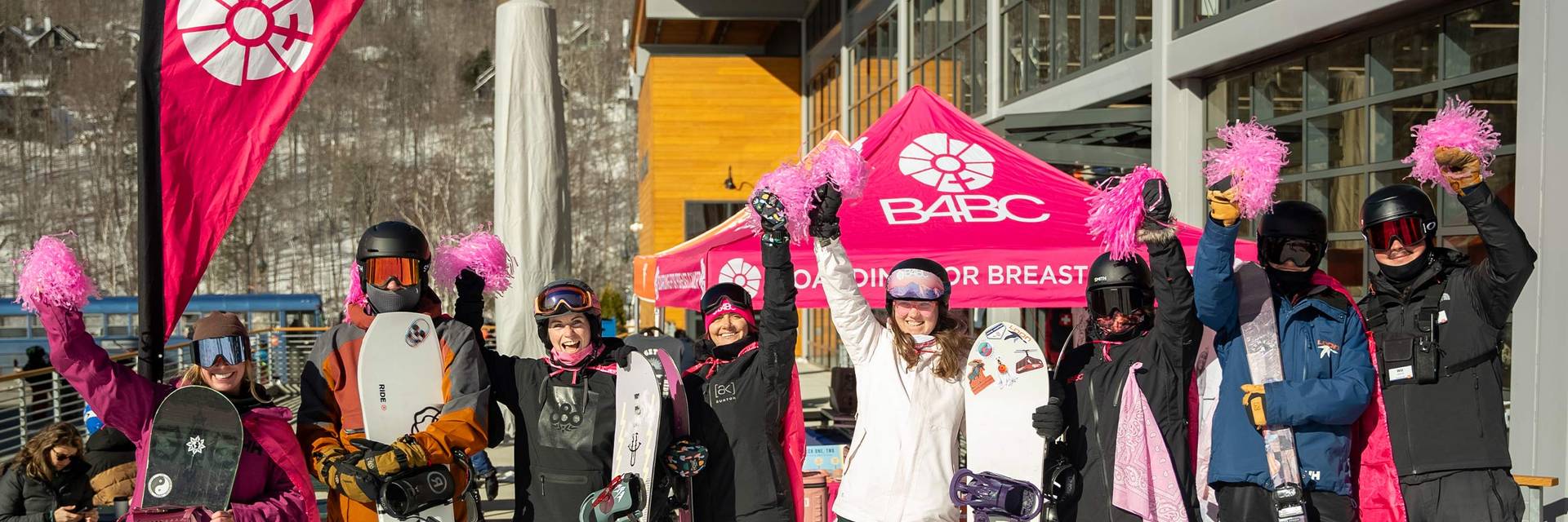 Girl Snowboarding with Pink pom pom