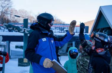 Seasonal program coach high-five students