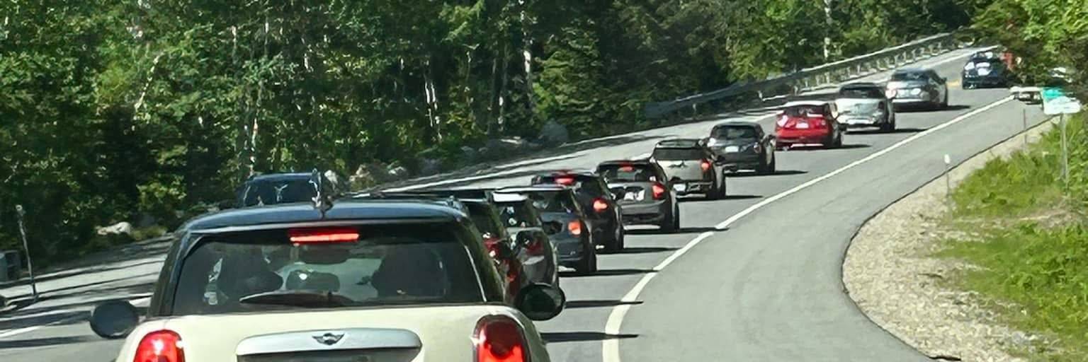 MINI Coopers driving the Kancamagus Highway