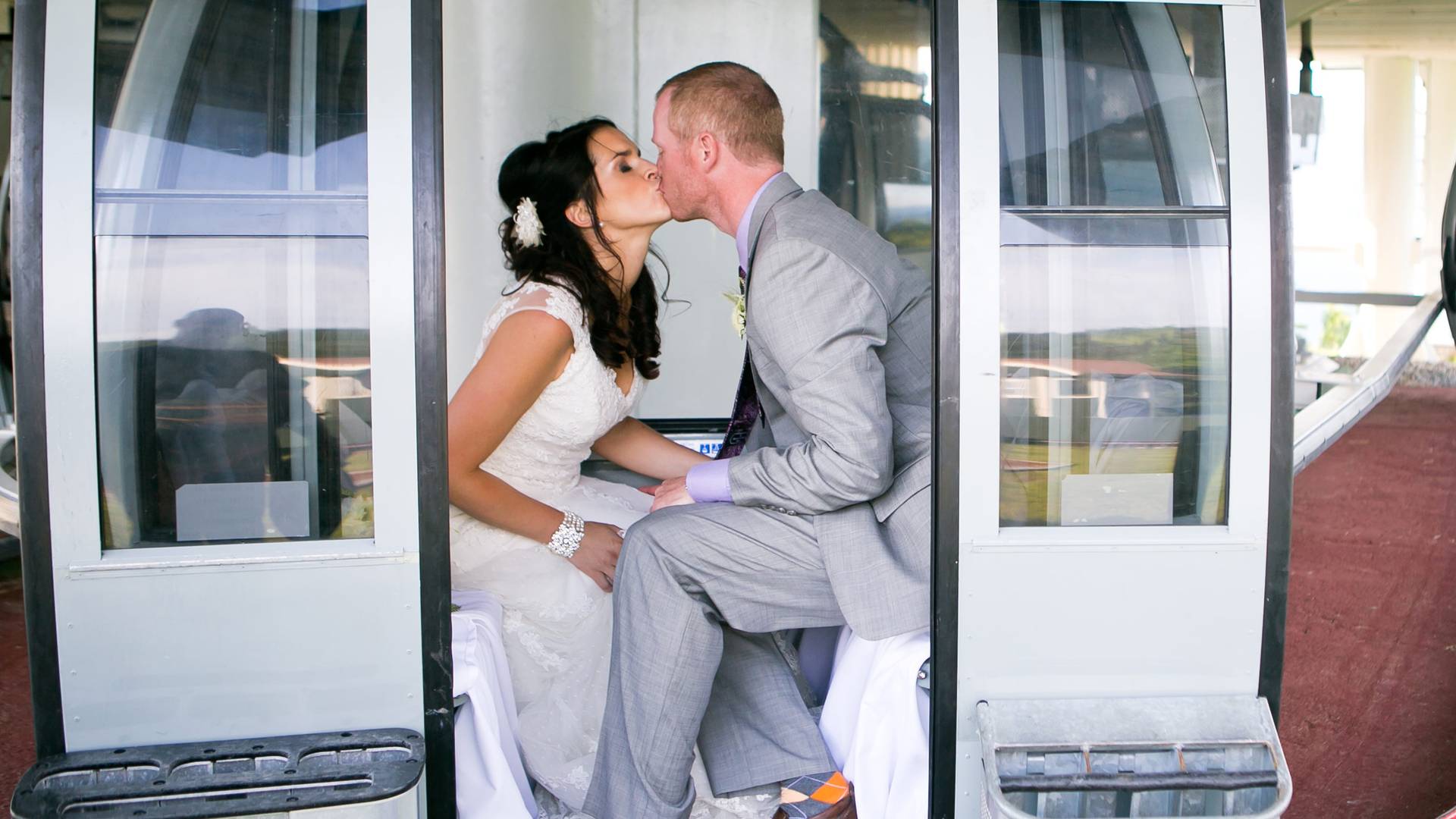 Wedding couple in gondola cabin