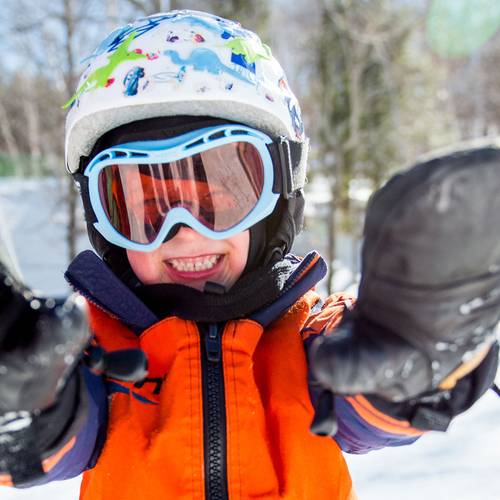Young Scouts participant, smiling at the camera