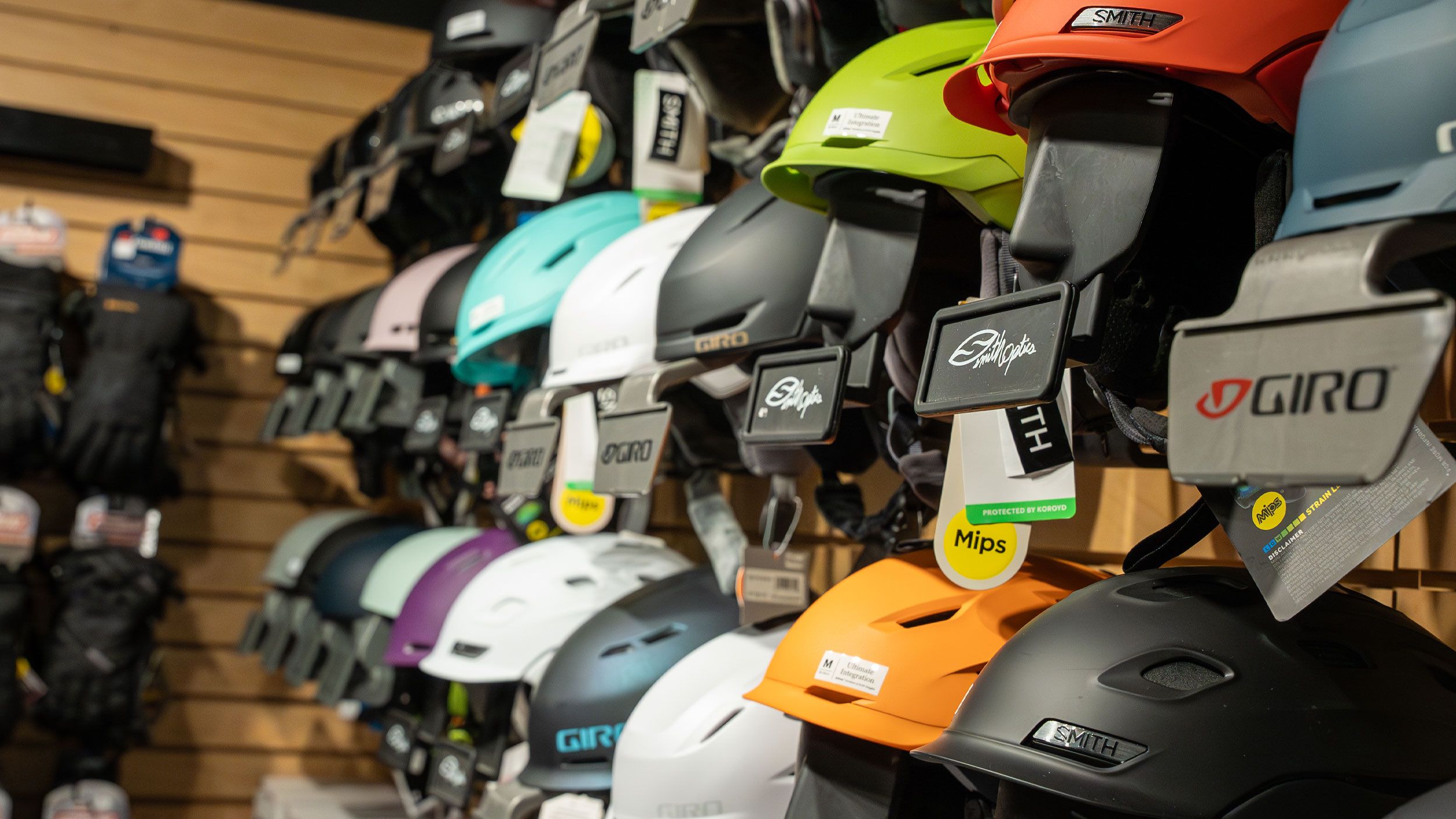 Loon Mountain Sports ski and snowboard helmets on the wall