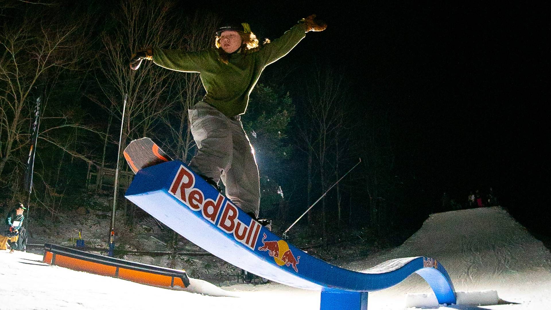 Snowboarder riding Red Bull Rail