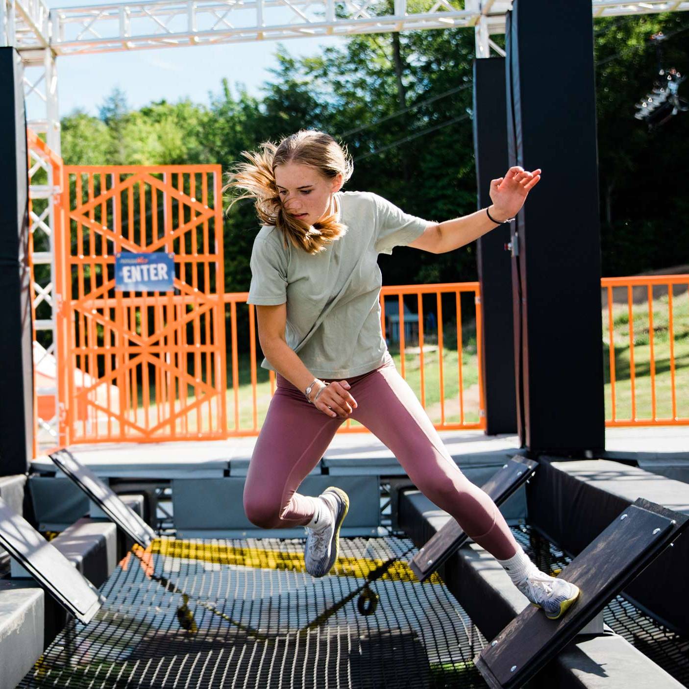 woman on the ninja wild obstacle course