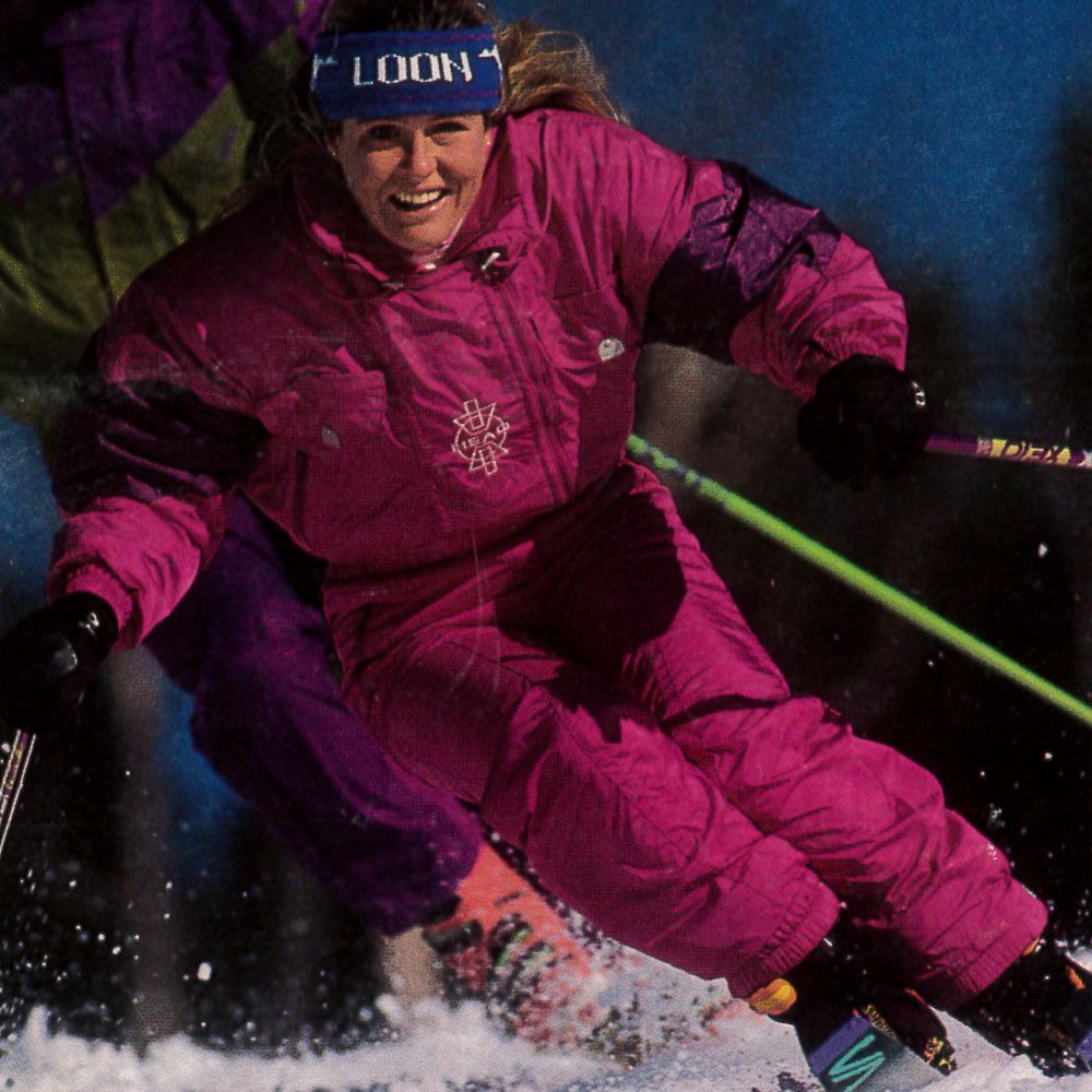 old image of a female skier wearing a loon headband