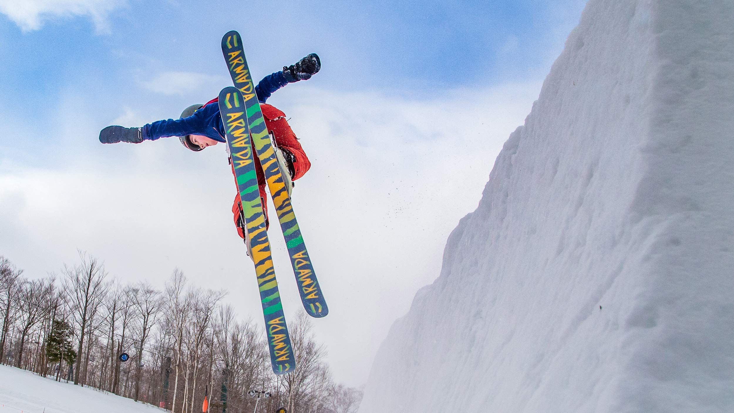 Freeskier going off jump