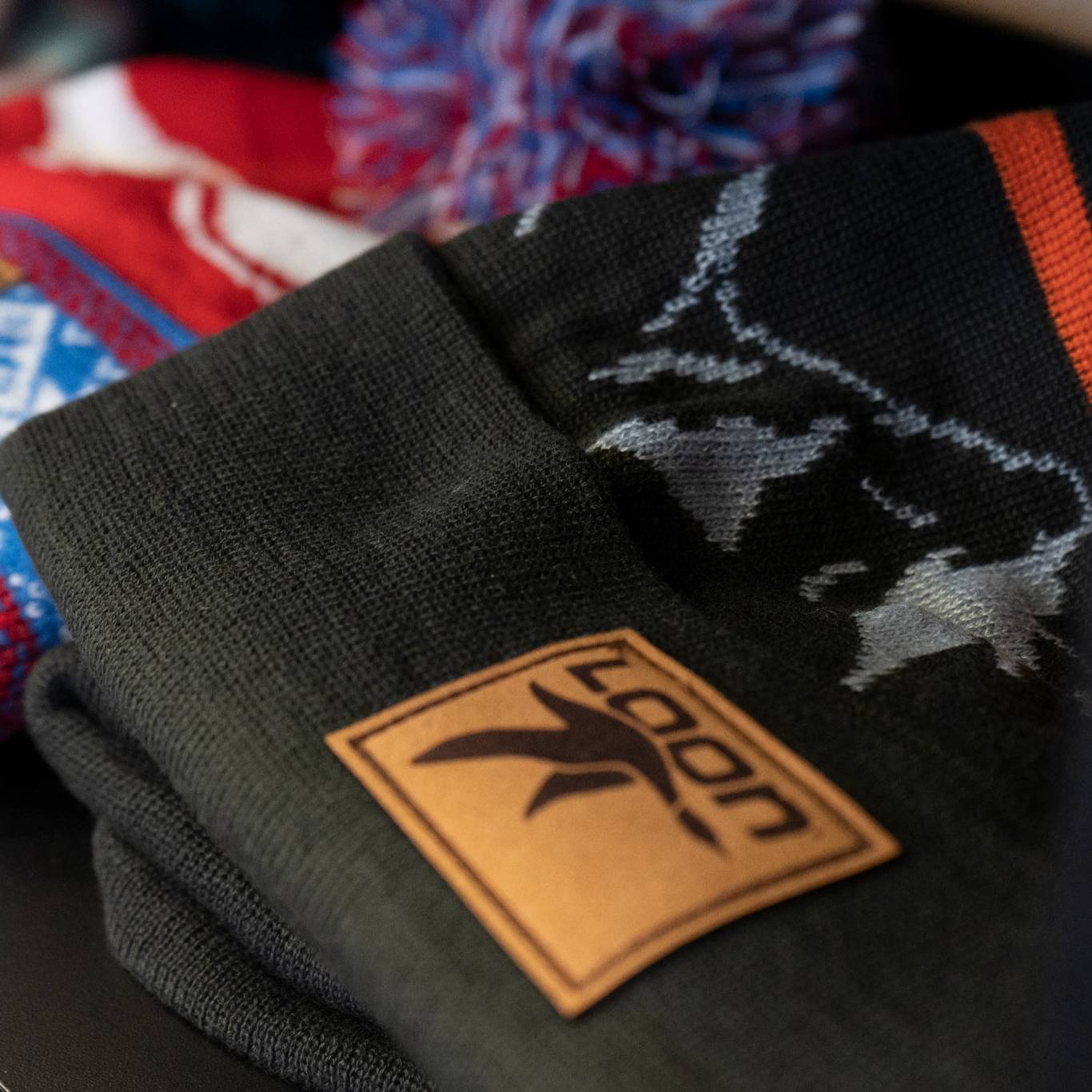 picture of winter hats with Loon logos