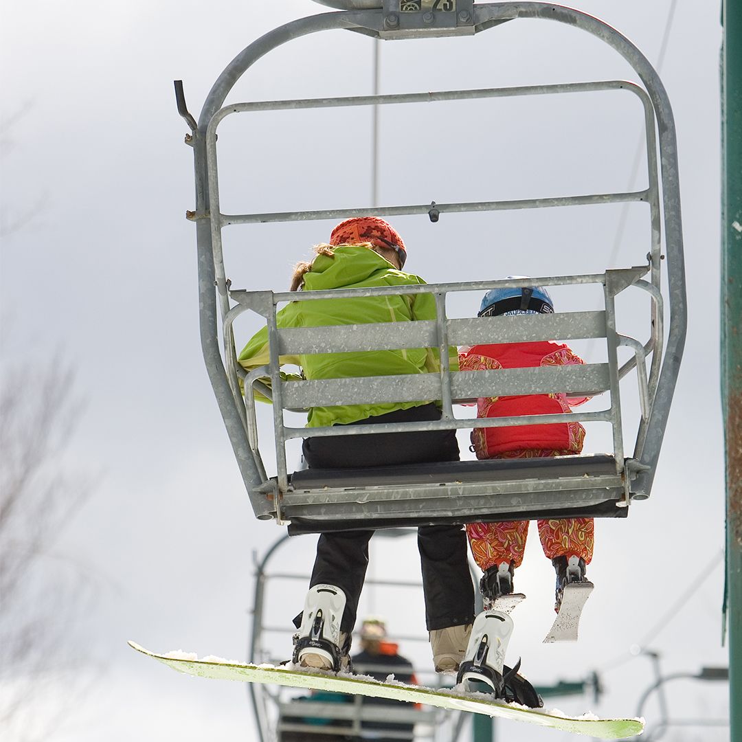 People sitting on Little Sister Chairlift