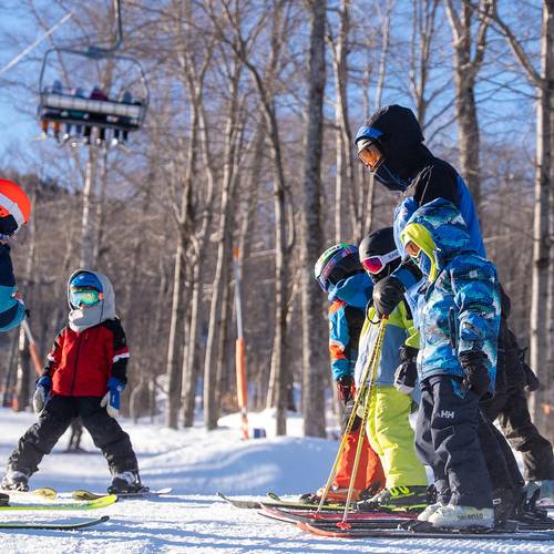 group of kids and their coach