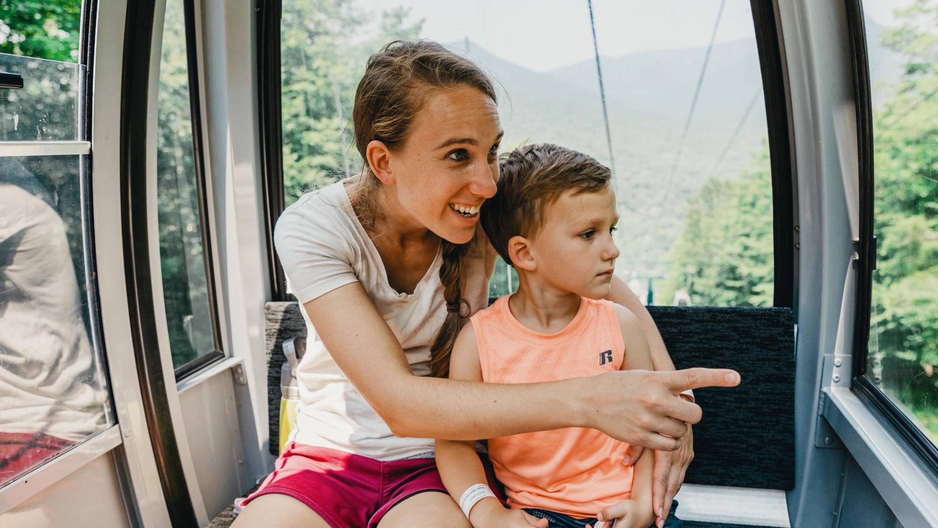 mother and son enjoying the view from the gondola skyride