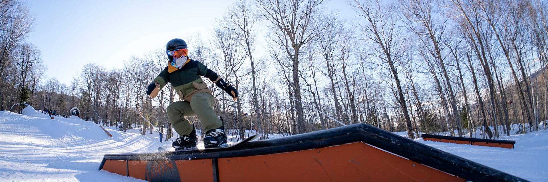 Young snowboarder performing a grab