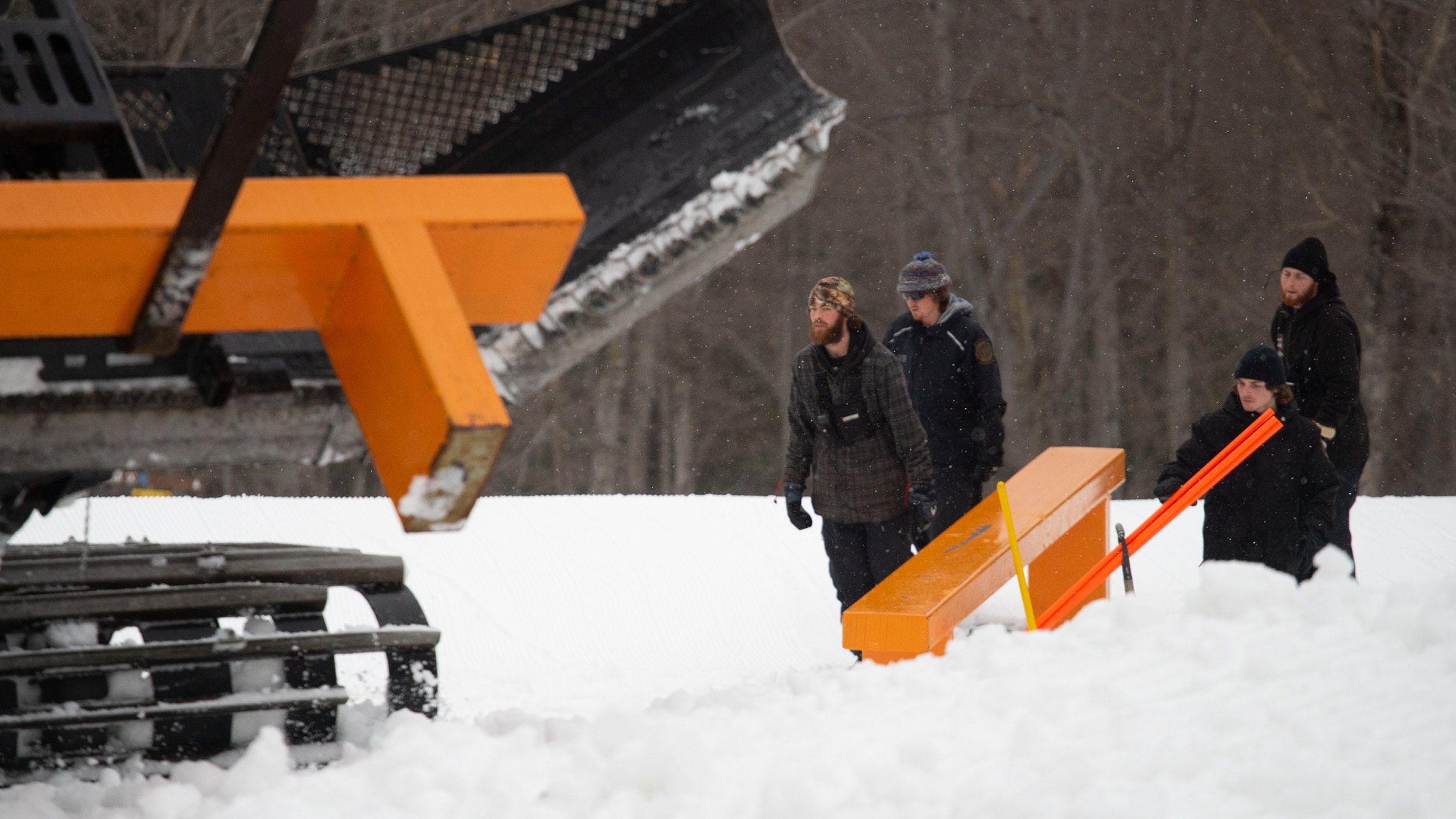 Park crew placing a steel jib feature in Loon Mountain Park.