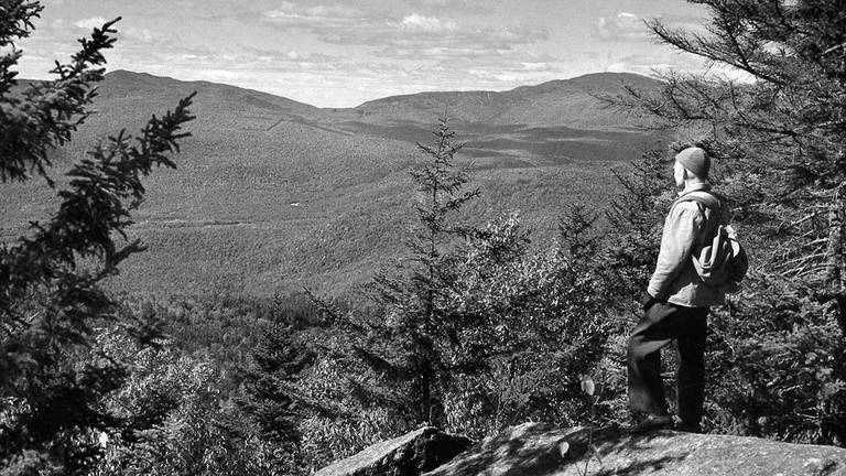Sherman Adams at the top of a mountain