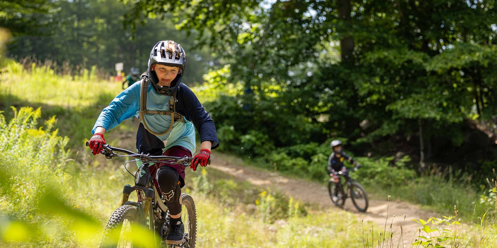 Boy riding Mainline bike trail in the Kids Rip Bike Camp