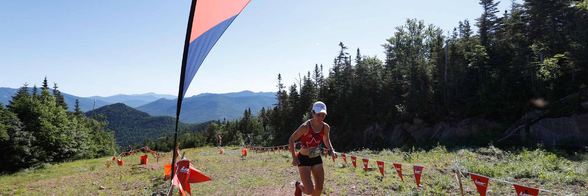 Image of female racer ascending Loon Mountain