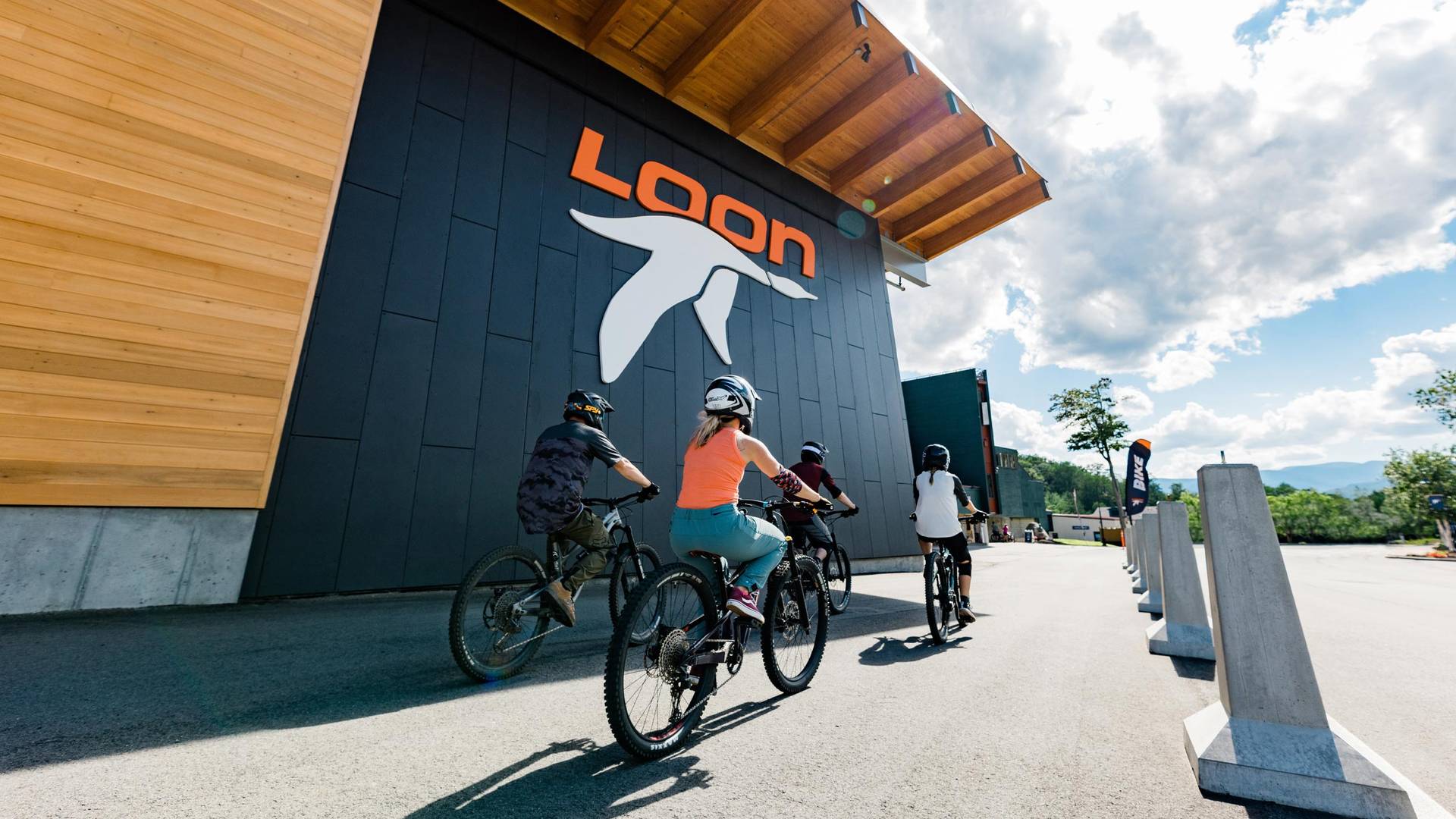 Group of bikers riding toward the Kanc 8 lift