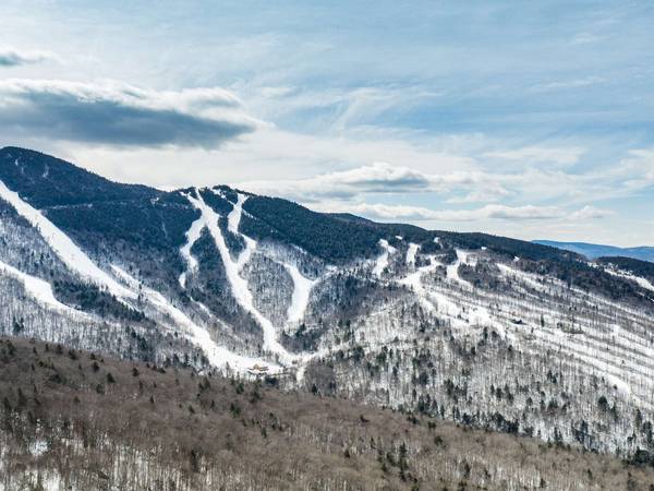Drone image of Loon in the winter showing ski slopes.
