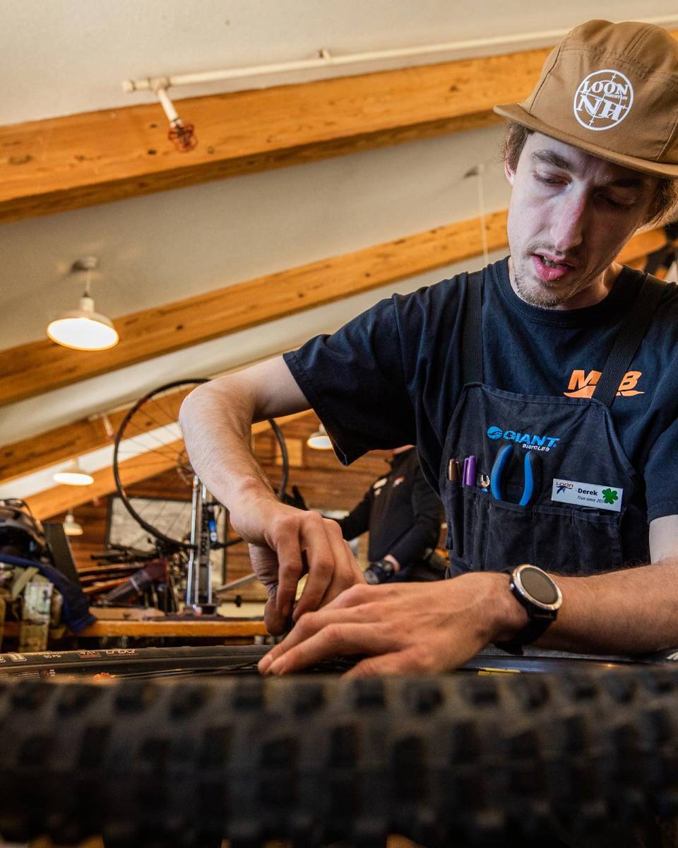 Mechanic working on bike