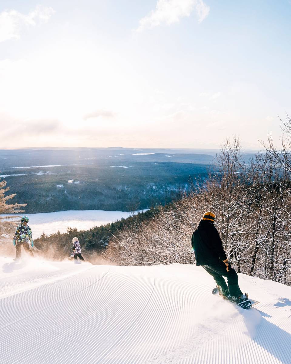 skiing with lake views