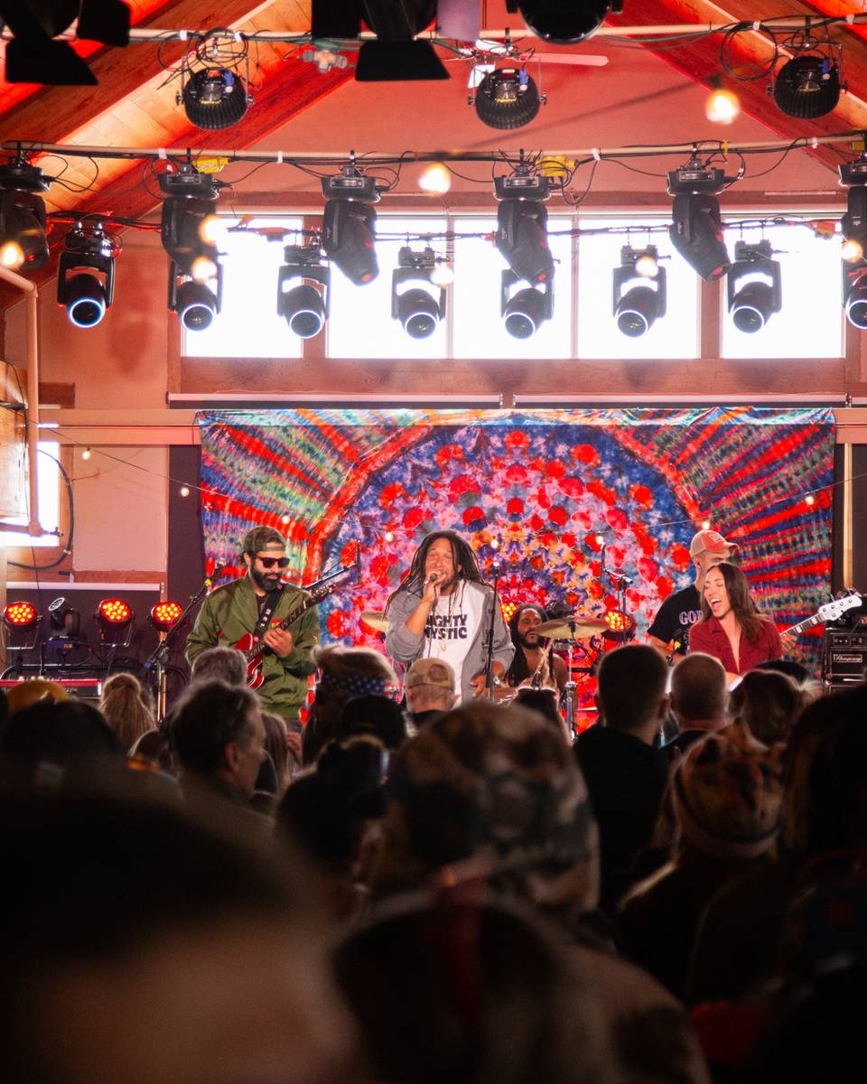 A packed house enjoys a concert.