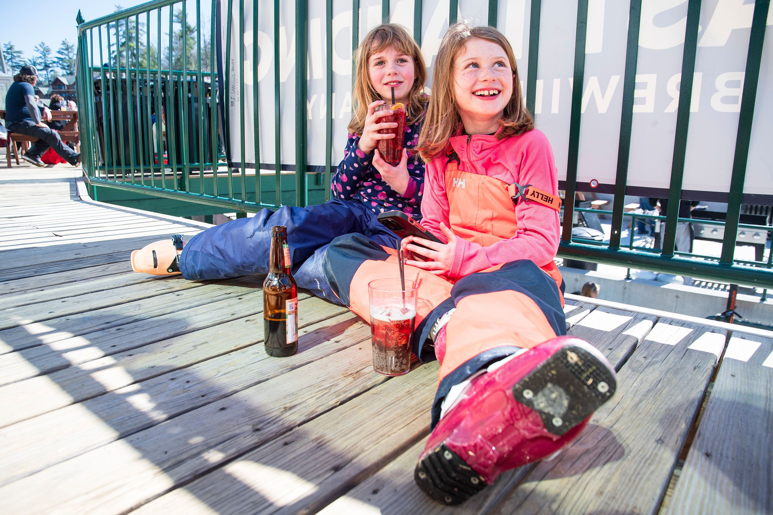 Little girls enjoy a soda on Blizzards Deck