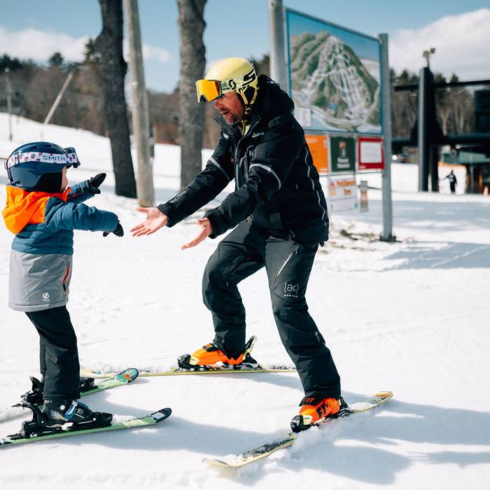 Little boy in lesson with an instructor