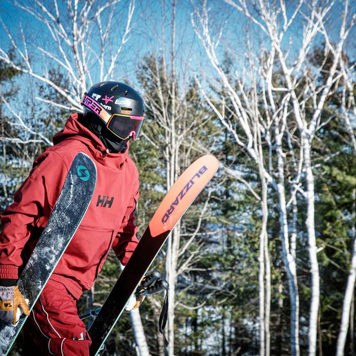 Male skier heads out to the park