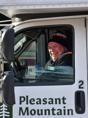 Park Ranger smiles at the summit