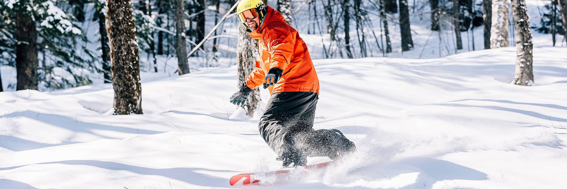 Snowboarder cruises through snow