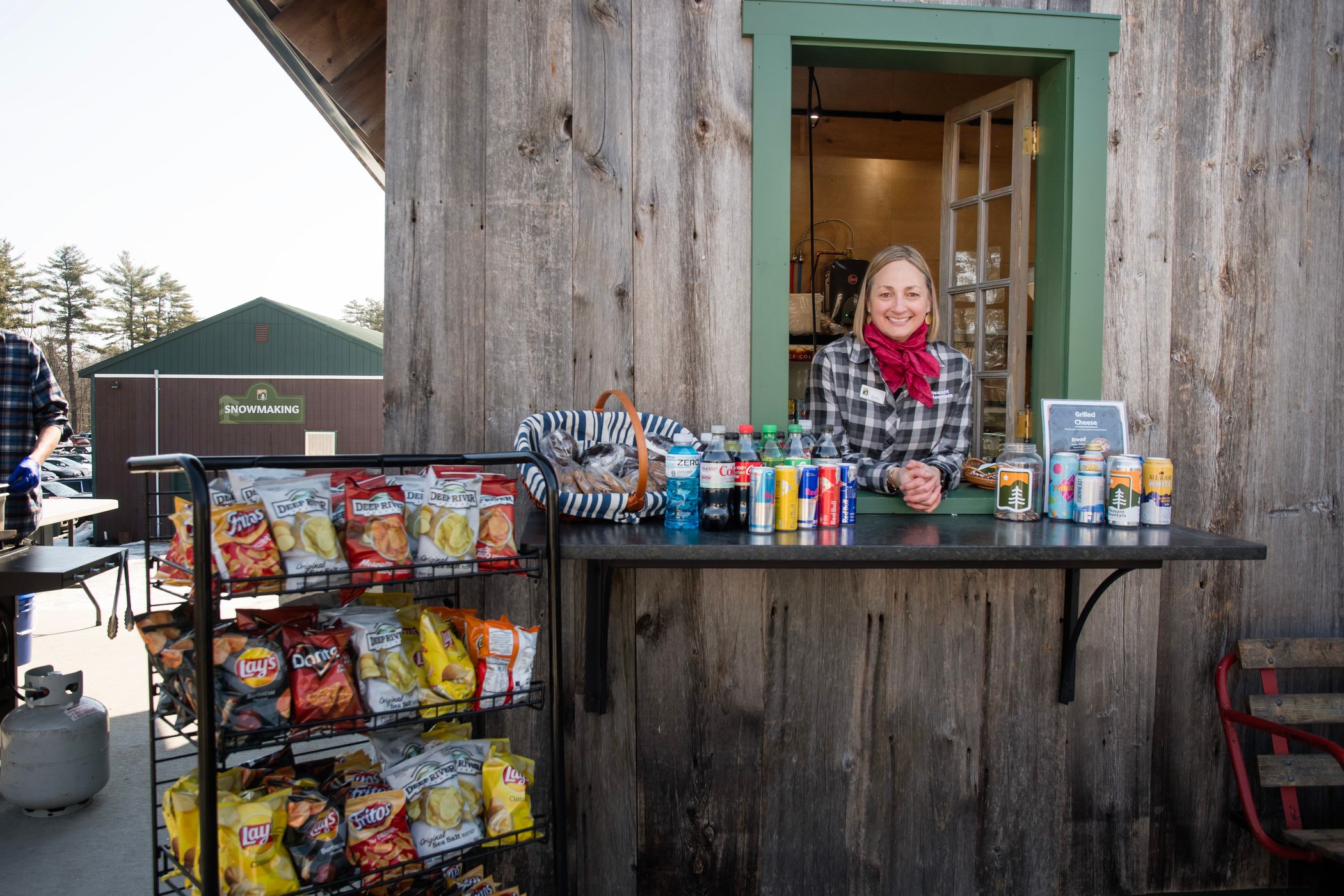 Smiling staff member in the Mountain Haus