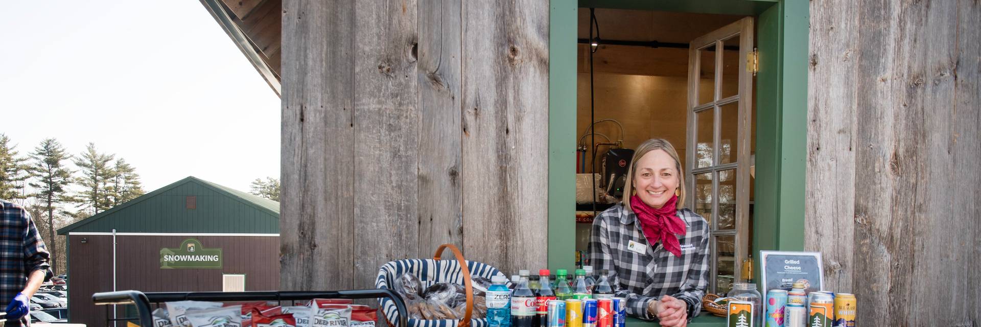 Smiling staff member in the Mountain Haus
