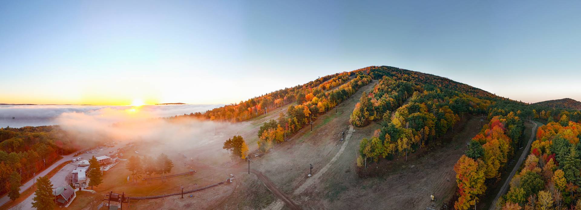 Sunrise over Pleasant Mountain during the foliage season