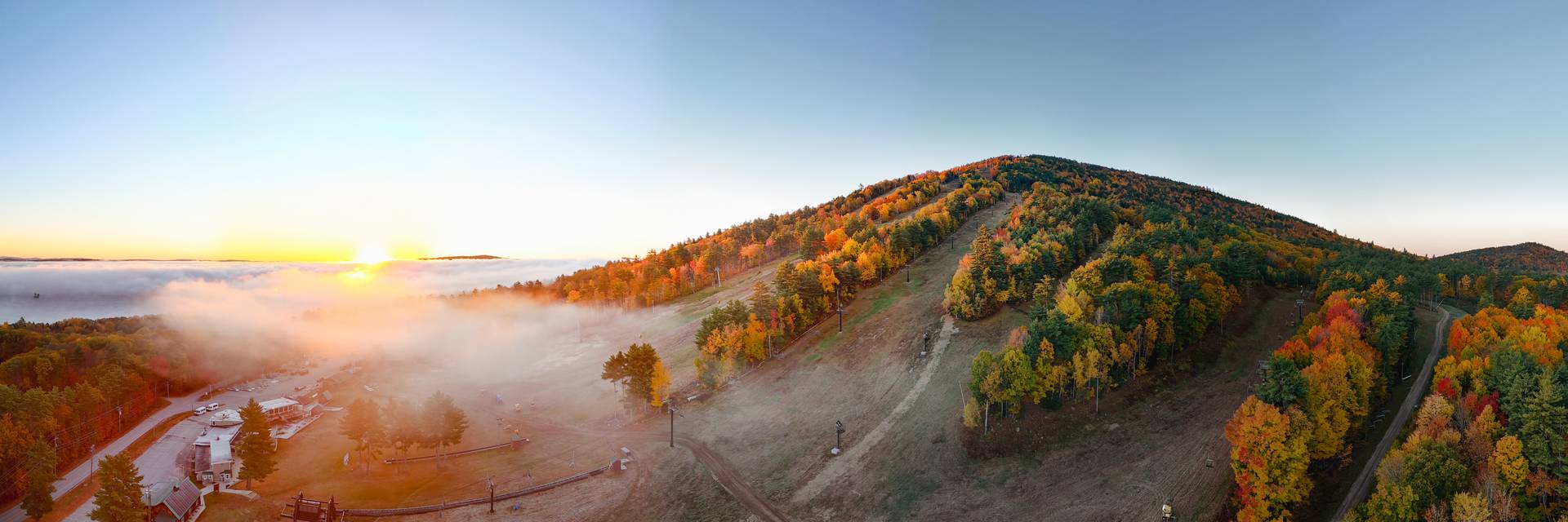Sunrise over Pleasant Mountain during the foliage season