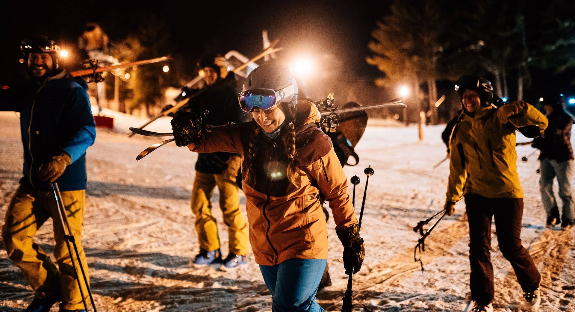 Group of skiers head out for night skiing