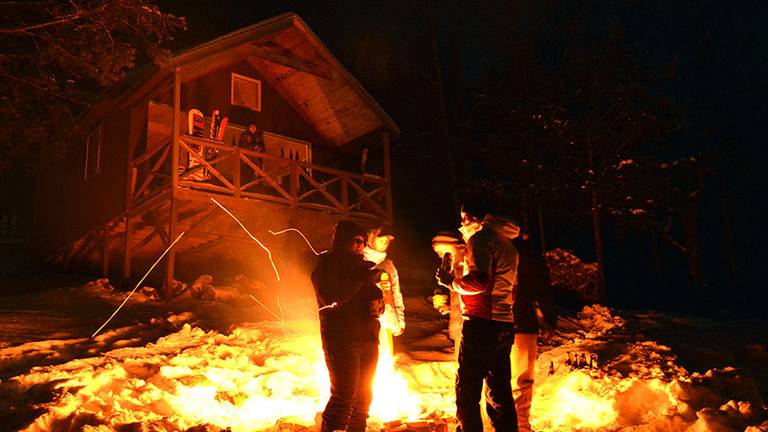 Wood is supplied for the outdoor fire pit