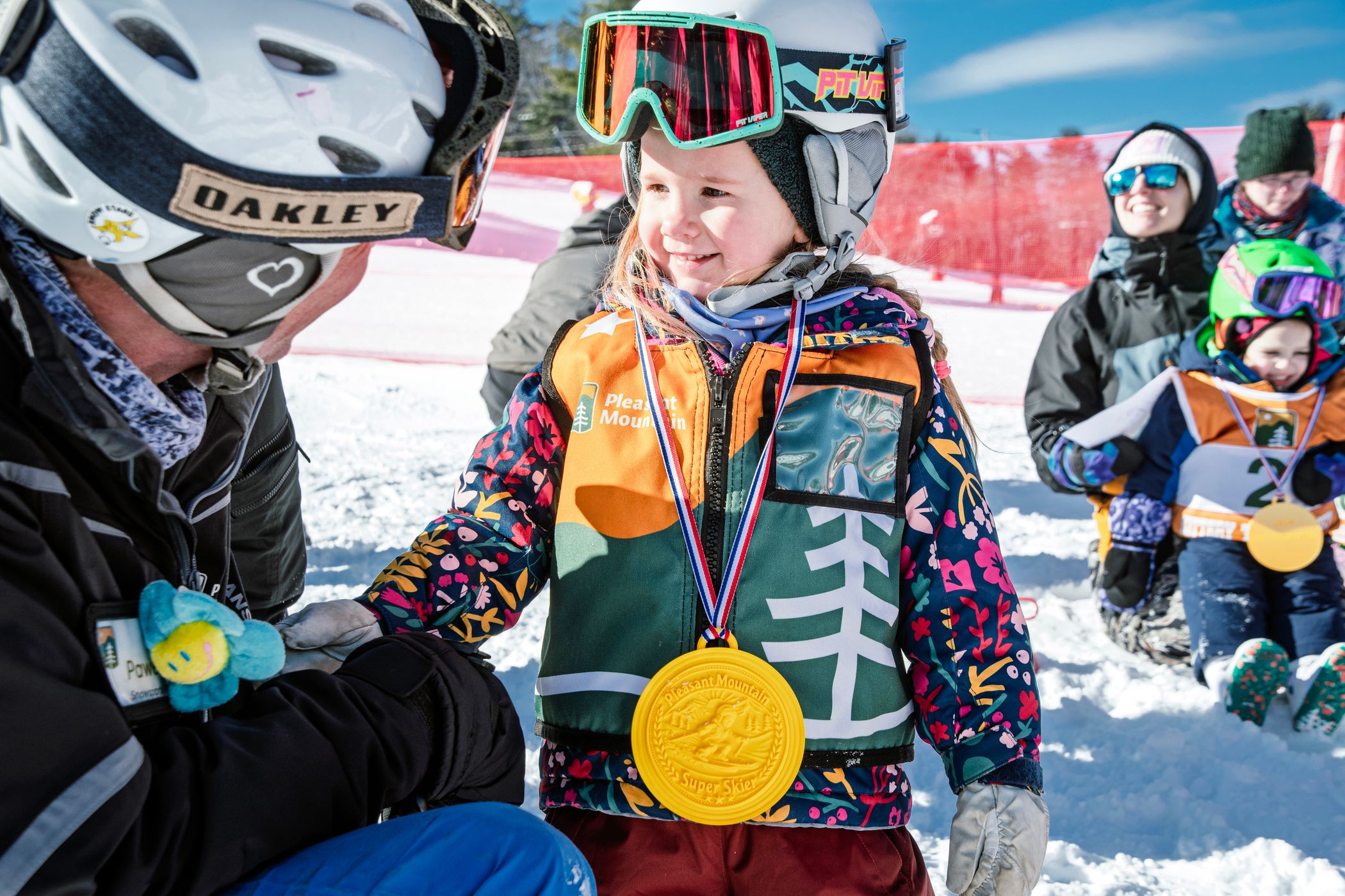 Sweet little girl smiles at instructor
