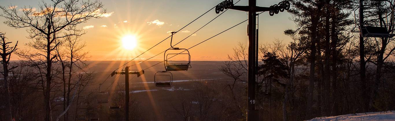 Sunrise at the summit of Pleasant Mountain ski resort.