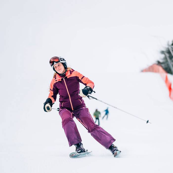 Happy Lady skiing on Headwall