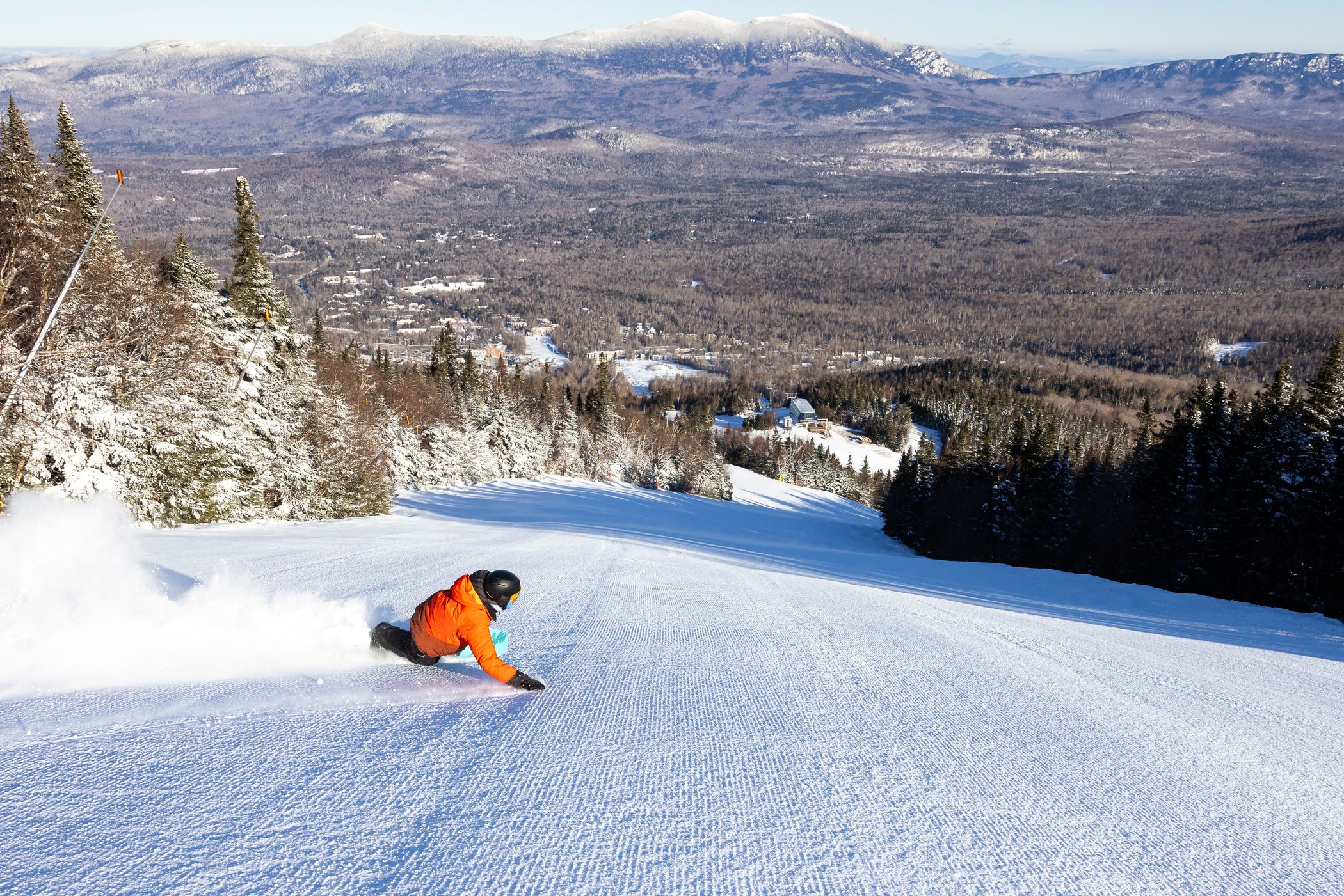 Snowboarder carving on the legendary Widowmaker trail at Sugarloaf