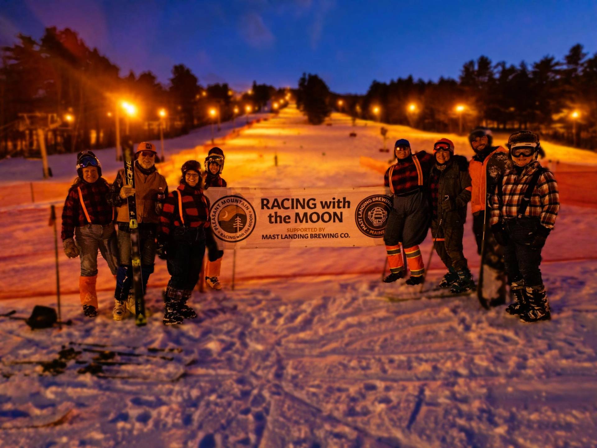 Race team dressed up in costume ready to race with the moon