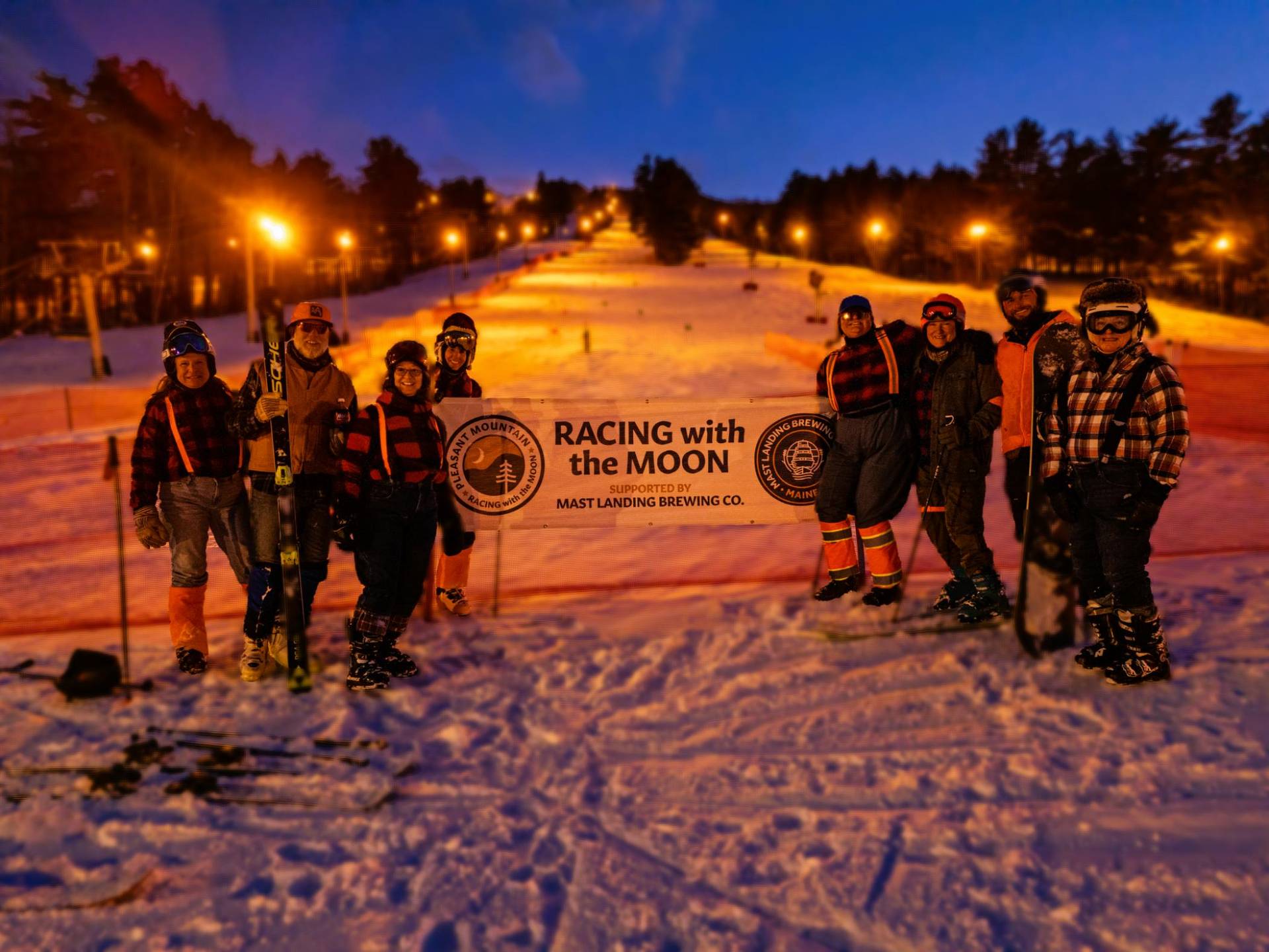 Race team dressed up in costume ready to race with the moon