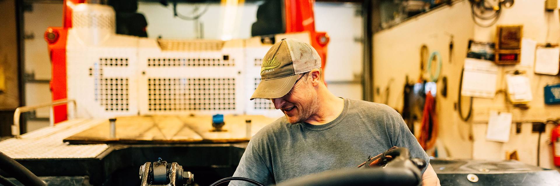 Lift operator gives high-five to guest loading chair lift