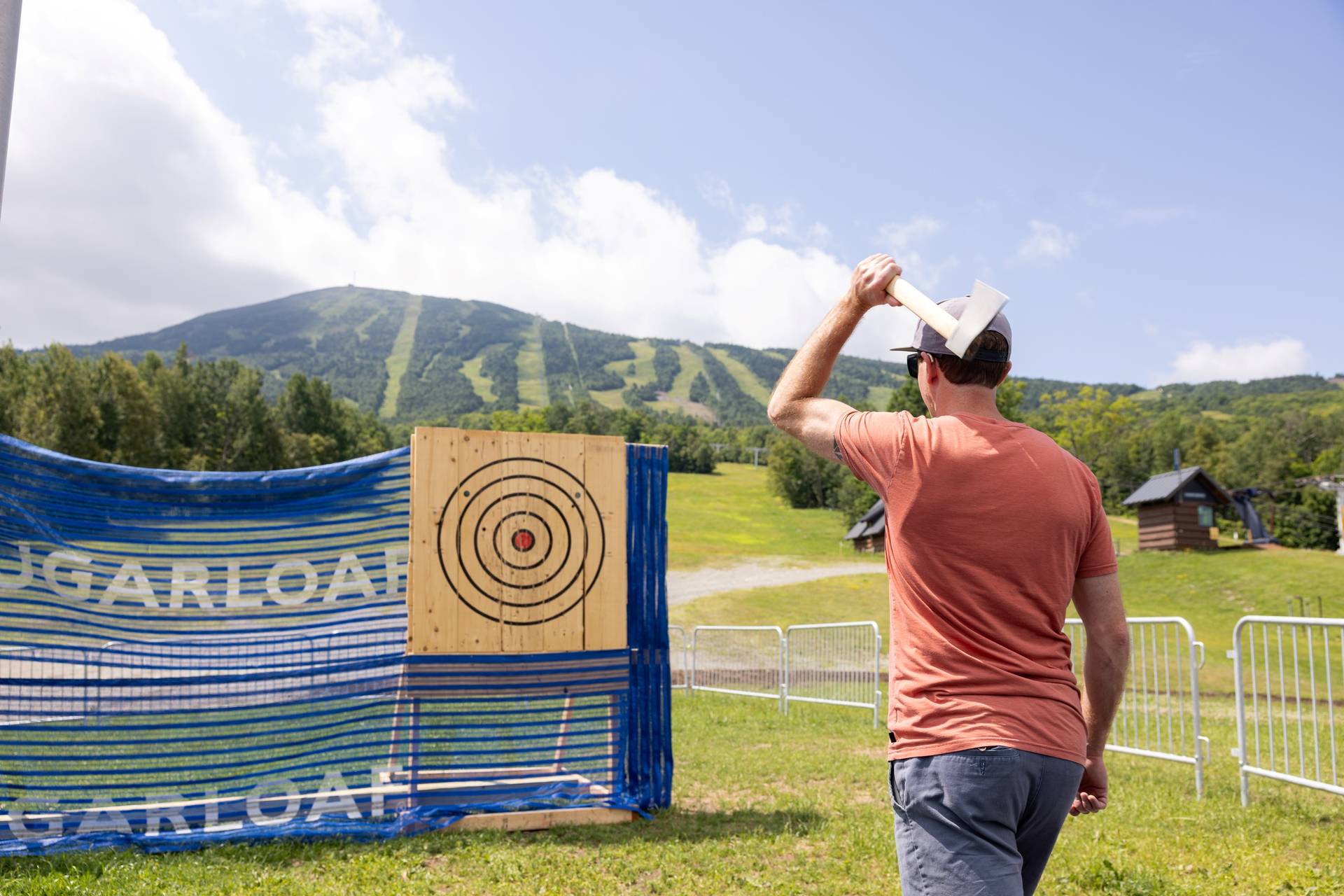 Man throwing an axe at a target