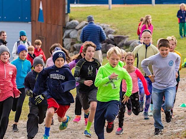 group of kids running in race