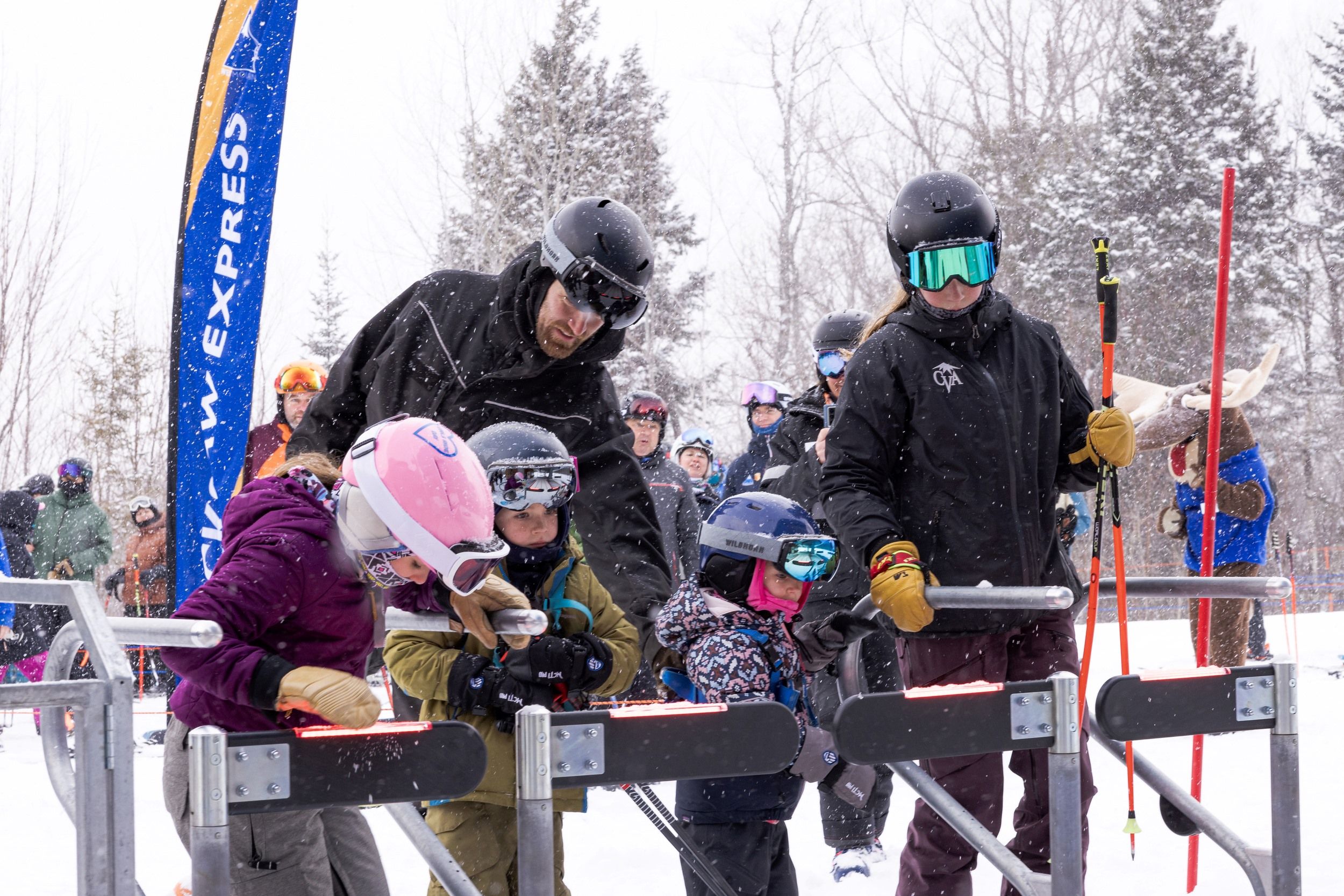 Young skiers at lift gate