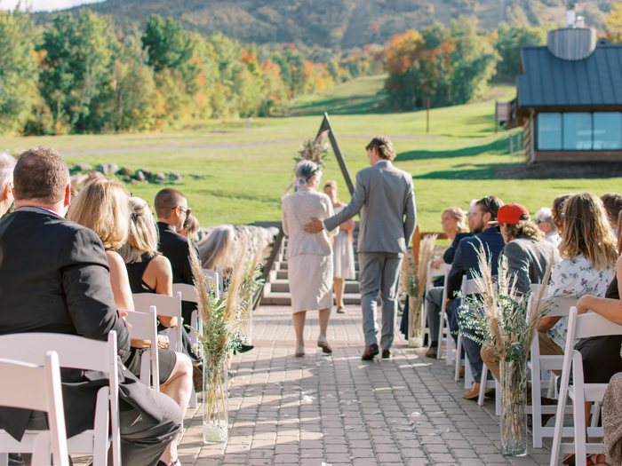 Groom walking down the aisle