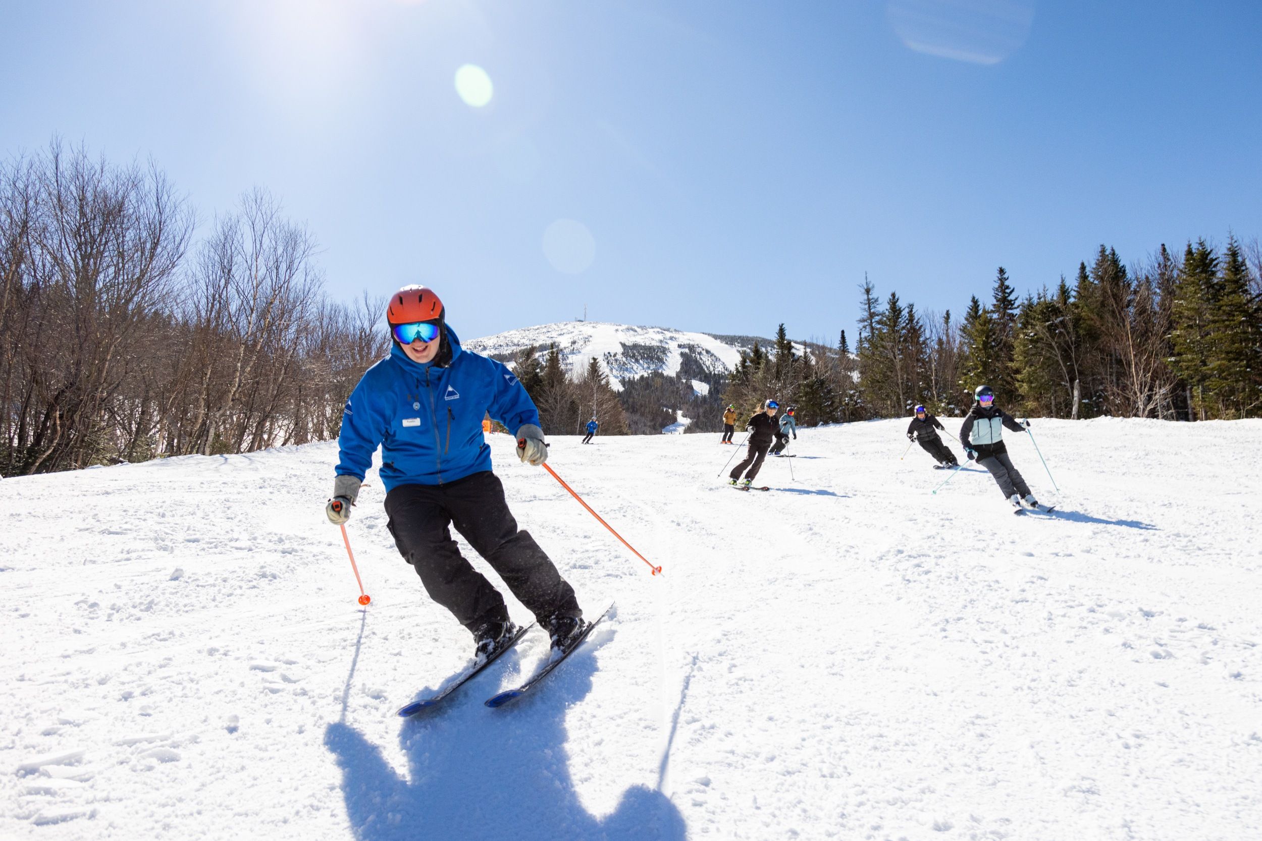 Ski instructor smiling at camera